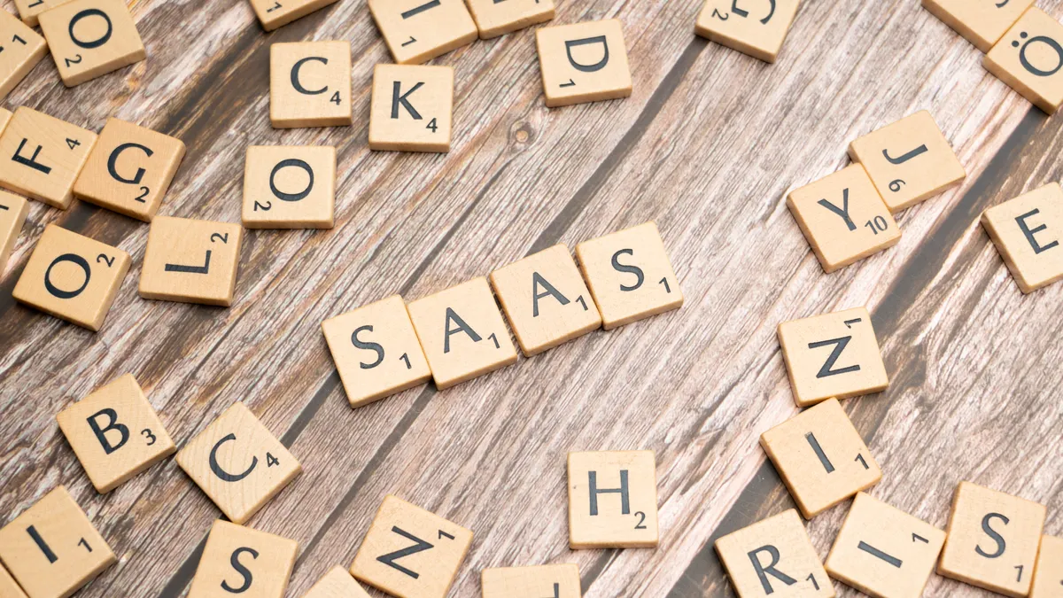 Best SaaS Tools for Email Marketing — Scrabble letters spelling saas on a wooden table