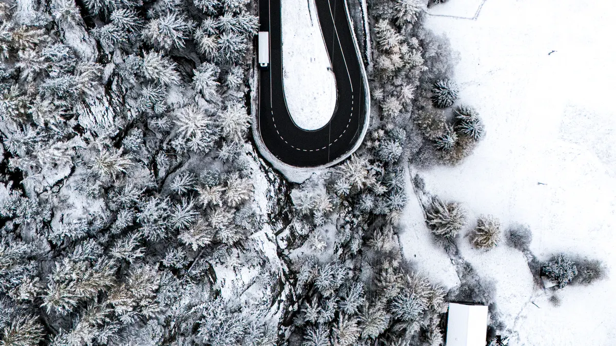 SaaS Pricing Models Explained: Per User, Per Seat, and Usage-Based — Aerial Winter View of Saas-Fee Road